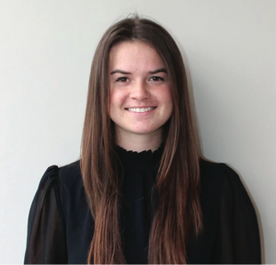 UGA undergraduate student Grace Swords in front of a white wall background.