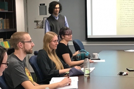 Dr. Joshua Bousquette leads a class discussion with graduate students at the University of Georgia.